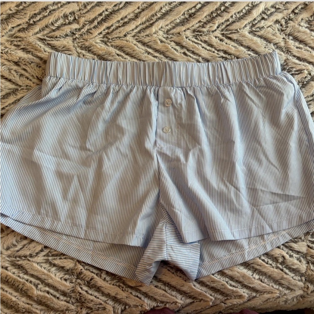 Blue and white striped boxer-style shorts